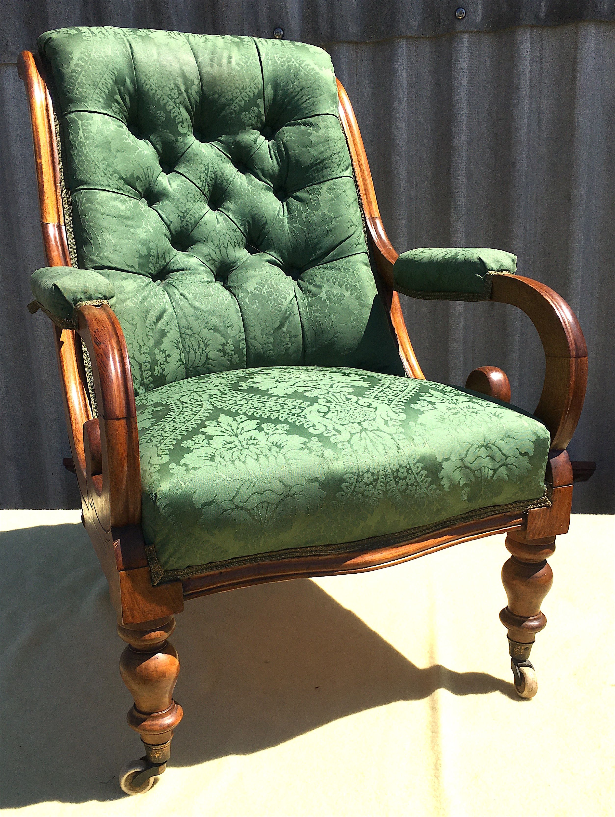 A mid Victorian upholstered mahogany armchair, width 66cm, depth 70cm, height 94cm